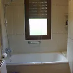 En Altos De *